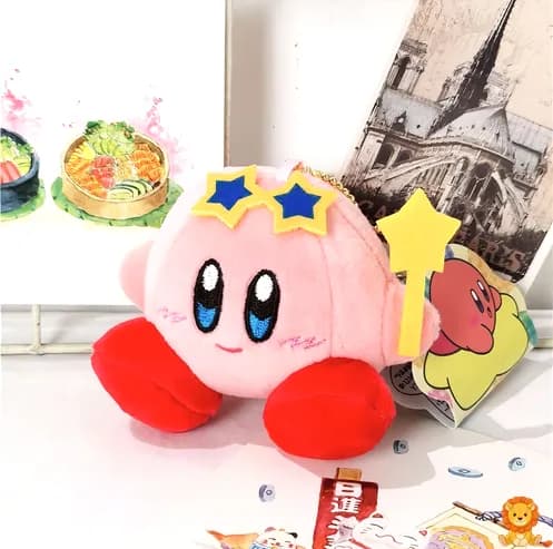 Mavi yıldızlarla süslenmiş, sevimli pembe Kirby peluş oyuncak. Yumuşak dokulu, yüksek kaliteli malzemeden üretilmiş, çocuklar ve koleksiyoncular için ideal. - View 2