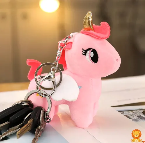 Adorable pink unicorn plush toy with a shimmering golden horn, soft pink mane and tail, and embroidered eyes, perfect for cuddling and imaginative play. - View 5