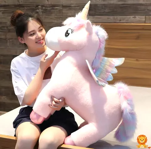 ตุ๊กตา ยูนิคอร์น สีชมพู นุ่มนิ่ม น่ารัก มีขนปุยสีชมพูอ่อน ดวงตากลมโต และแผงคอสีรุ้ง เหมาะสำหรับเป็นเพื่อนเล่นหรือของตกแต่งห้อง - View 2