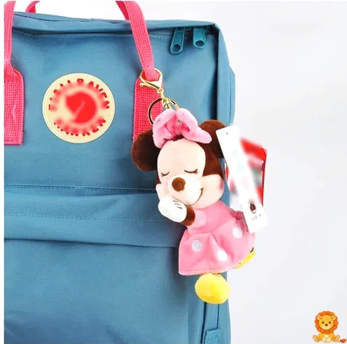 Uyuyan Minnie Peluş, pembe pijamaları ve uyku şapkasıyla, yumuşak ve sevimli bir görünümde. Çocuklar ve Disney hayranları için mükemmel bir uyku arkadaşı. - View 2