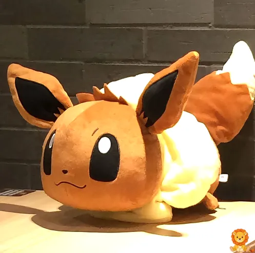 Eevee plush pillow, featuring a soft, cuddly Eevee design, perfect for snuggling and relaxation, officially licensed Pokémon merchandise. - View 2