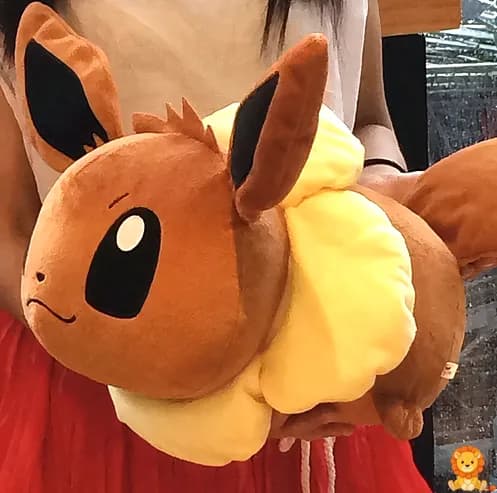 Eevee plush pillow, featuring a soft, cuddly Eevee design, perfect for snuggling and relaxation, officially licensed Pokémon merchandise. - View 3