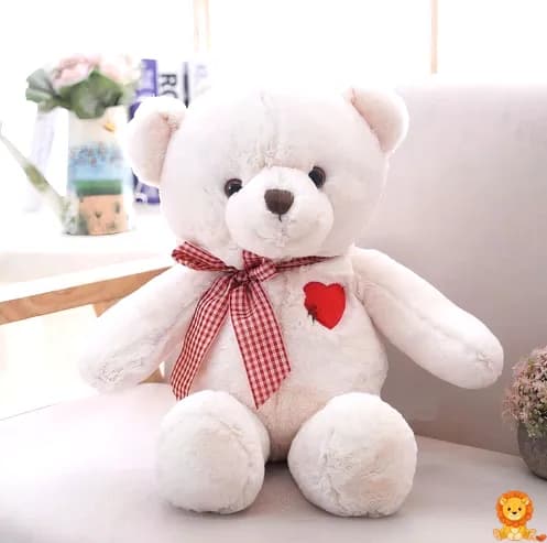 Tierno peluche de oso blanco sosteniendo un corazón rojo, ideal para expresar amor y afecto, disponible en diferentes tamaños. - View 2
