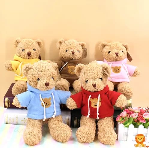 Boneka beruang cokelat yang menggemaskan mengenakan sweter cokelat rajutan, duduk dengan senyum ceria, sempurna untuk dipeluk dan dimainkan. - View 2