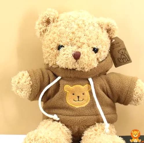 Boneka beruang cokelat yang menggemaskan mengenakan sweter cokelat rajutan, duduk dengan senyum ceria, sempurna untuk dipeluk dan dimainkan. - View 3