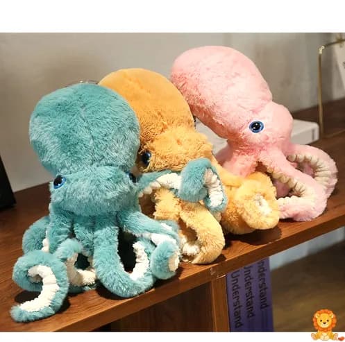 파란색 문어 봉제 인형, 커다란 눈과 미소를 짓고 있으며, 매우 부드러운 재질로 만들어졌습니다. 어린이와 성인 모두에게 완벽한 동반자입니다. - View 2