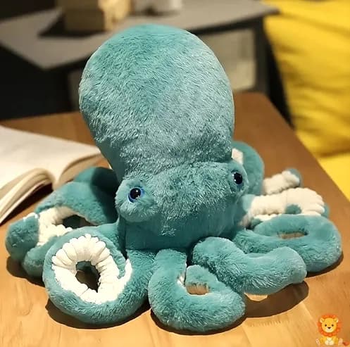 파란색 문어 봉제 인형, 커다란 눈과 미소를 짓고 있으며, 매우 부드러운 재질로 만들어졌습니다. 어린이와 성인 모두에게 완벽한 동반자입니다. - View 3