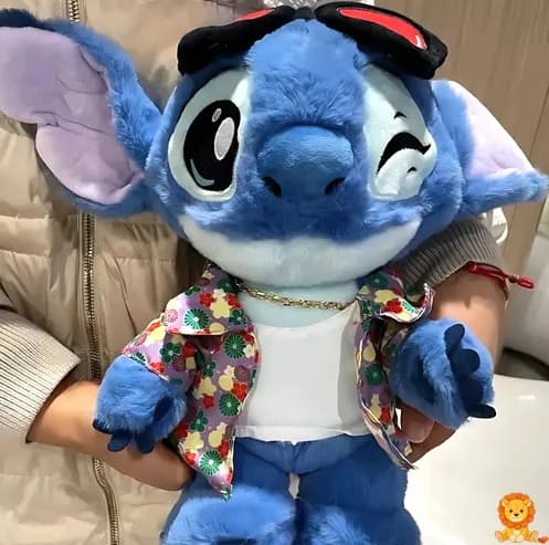 ตุ๊กตา Stitch สีฟ้าสดใส สวมเสื้อเชิ้ตลายดอกไม้หลากสีสัน น่ารัก น่ากอด เหมาะสำหรับเป็นเพื่อนเล่นและของสะสม - View 5