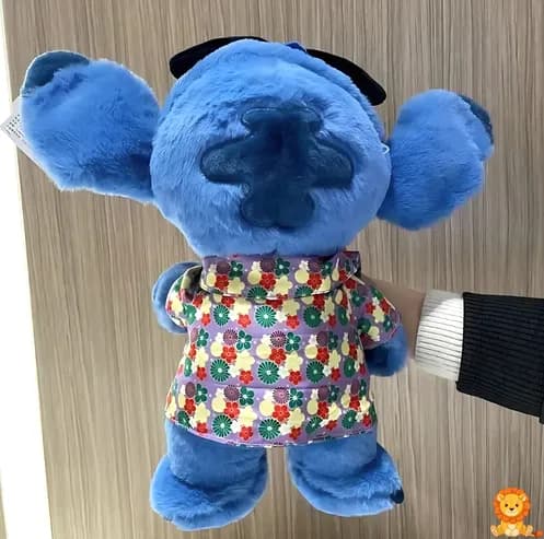 ตุ๊กตา Stitch สีฟ้าสดใส สวมเสื้อเชิ้ตลายดอกไม้หลากสีสัน น่ารัก น่ากอด เหมาะสำหรับเป็นเพื่อนเล่นและของสะสม - View 4