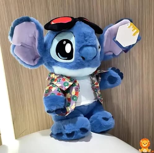 ตุ๊กตา Stitch สีฟ้าสดใส สวมเสื้อเชิ้ตลายดอกไม้หลากสีสัน น่ารัก น่ากอด เหมาะสำหรับเป็นเพื่อนเล่นและของสะสม - View 3