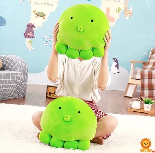 כרית תמנון ירוקה רכה, עשויה מחומרים רכים ונעימים, בצבע ירוק עז, עם עיניים גדולות וחמודות, מושלמת לחיבוק ושינה. - View 4
